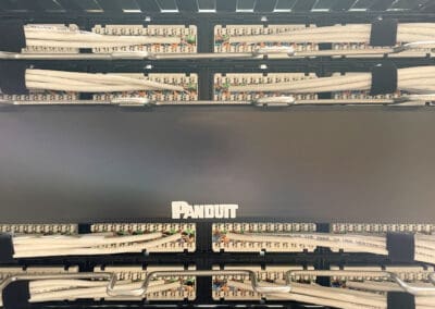 Panduit white cables attached to the system